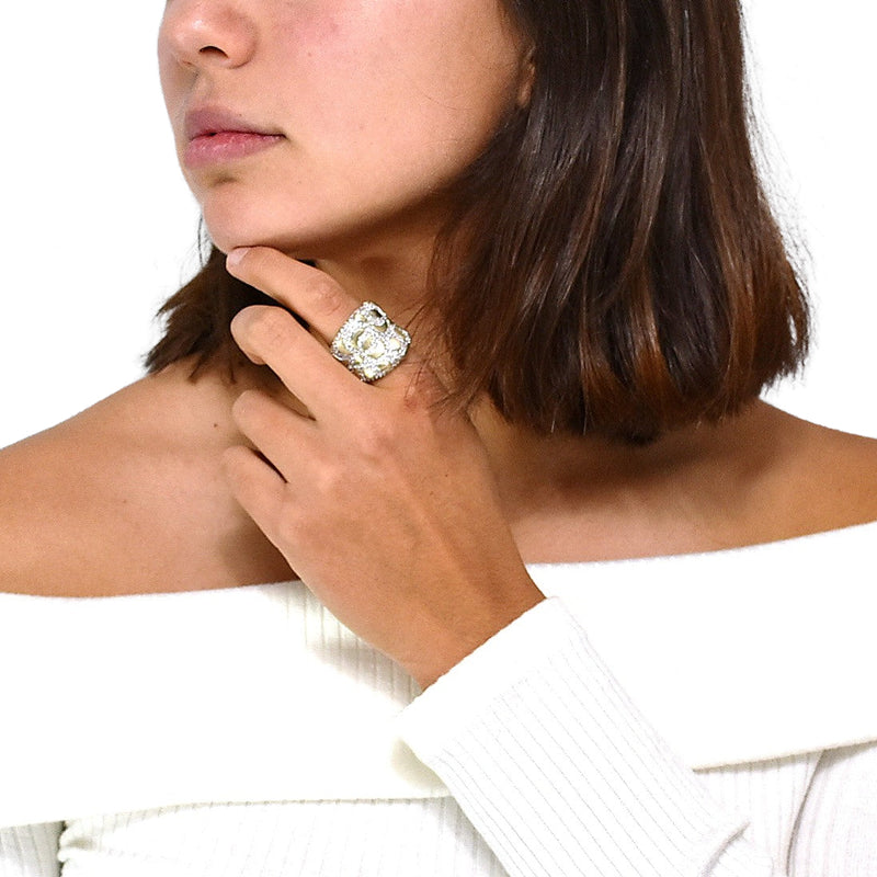 Anillo de Flor de Plata con Circonia y Chapa de Oro
