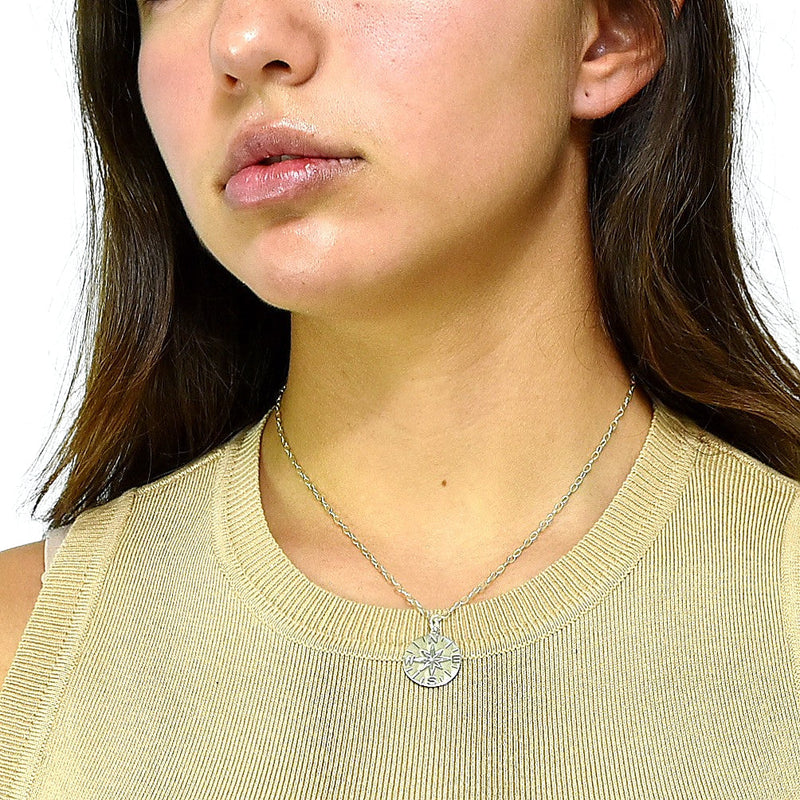Dije de Plata Brújula